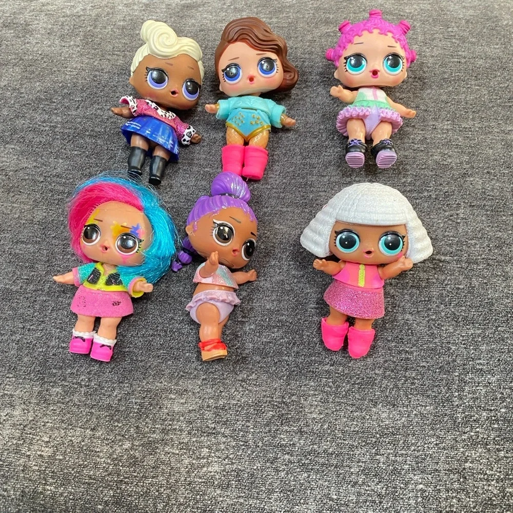 Six L.O.L Surprise dolls with 25 Piece  Accessories!